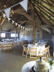 Red Barn - Red-Barn-Interior-beams-and-bunting